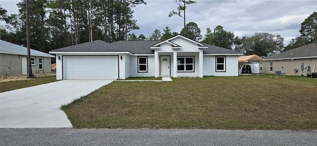 single story home featuring central AC unit, a front lawn, and a garage