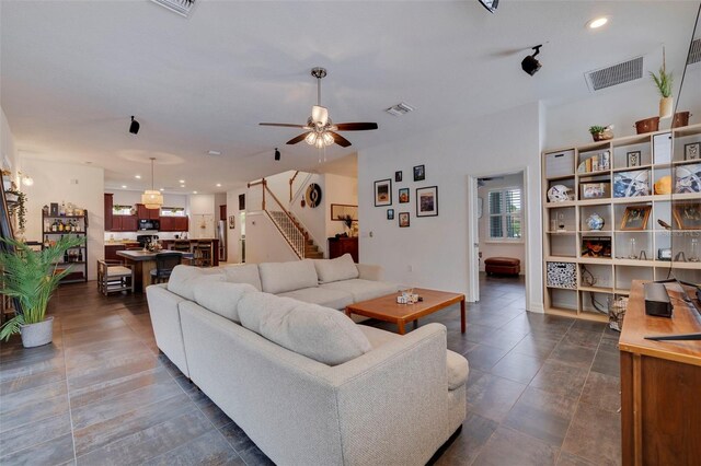 living room featuring ceiling fan