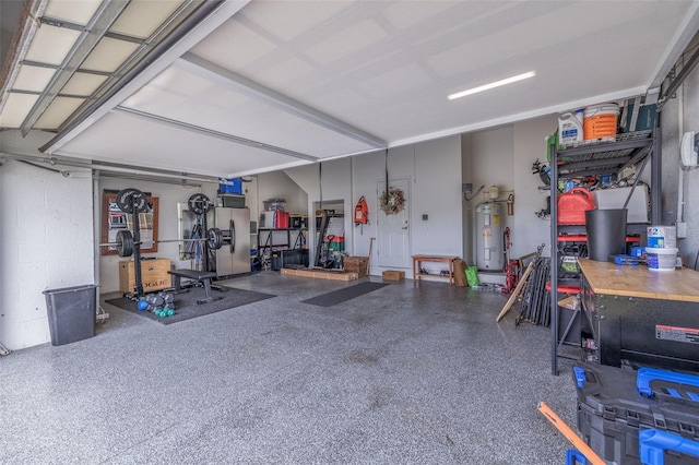 garage featuring stainless steel refrigerator with ice dispenser and water heater