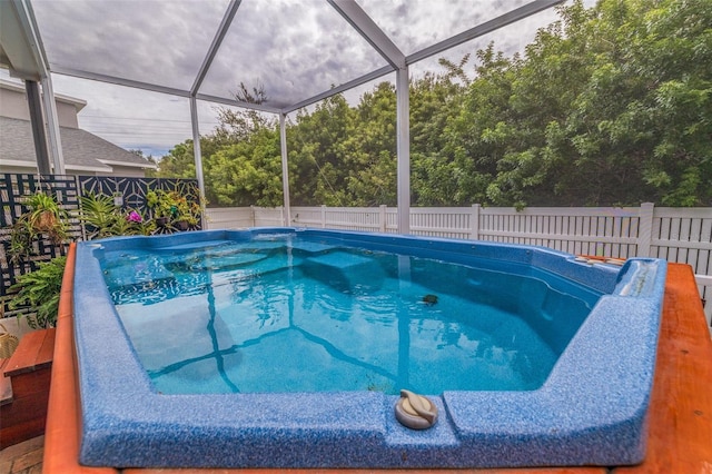 view of pool featuring a lanai