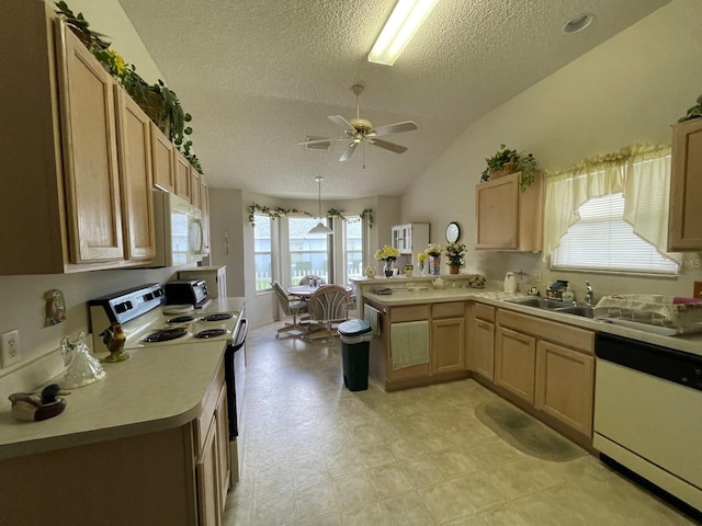 kitchen featuring ceiling fan, light tile patterned floors, vaulted ceiling, and white appliances