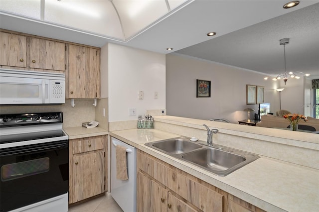 kitchen with sink, light tile patterned floors, ornamental molding, pendant lighting, and white appliances