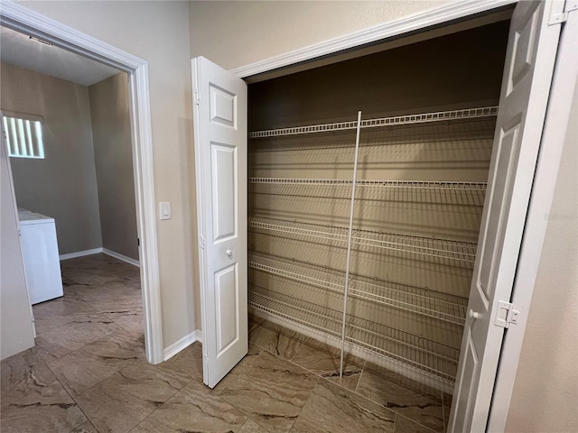 closet with washer / clothes dryer