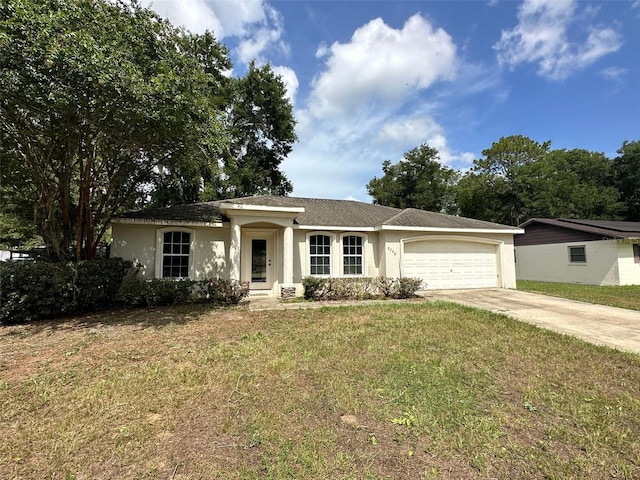 view of front facade featuring a garage and a front yard