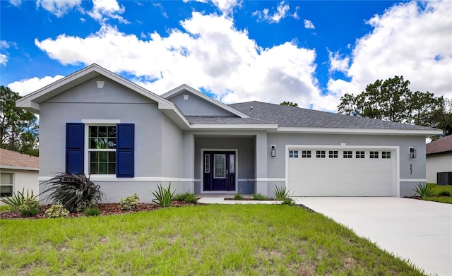 ranch-style home with an attached garage, driveway, a front lawn, and stucco siding