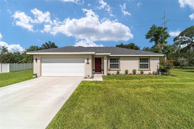 ranch-style home with a garage and a front lawn