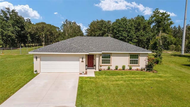 ranch-style house featuring a garage and a front lawn