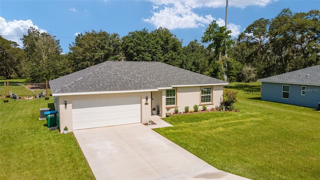 single story home featuring a garage and a front lawn