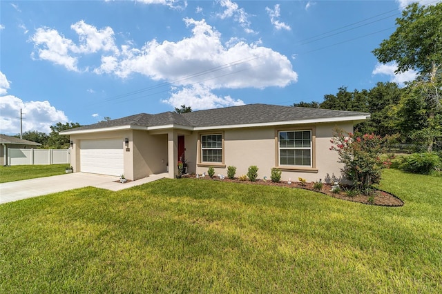 ranch-style home featuring a garage and a front lawn