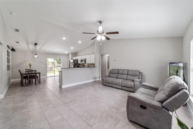 living room with vaulted ceiling and ceiling fan