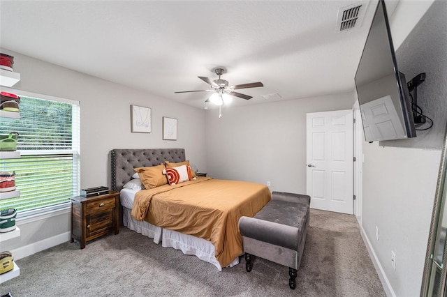 bedroom featuring ceiling fan and carpet floors