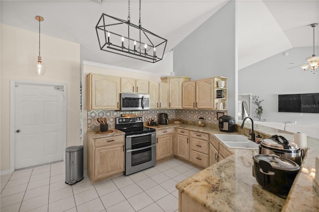 kitchen with stainless steel appliances, light brown cabinetry, sink, and decorative backsplash