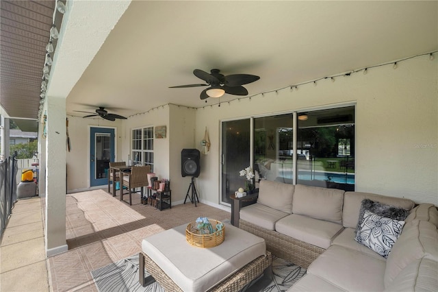 view of patio featuring outdoor lounge area and ceiling fan