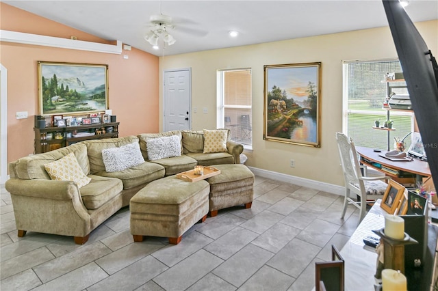 living room featuring ceiling fan and vaulted ceiling