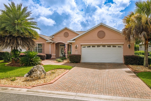 view of front of property with a garage