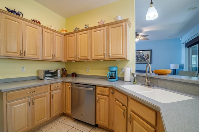 kitchen featuring light tile patterned floors, ceiling fan, stainless steel dishwasher, pendant lighting, and sink