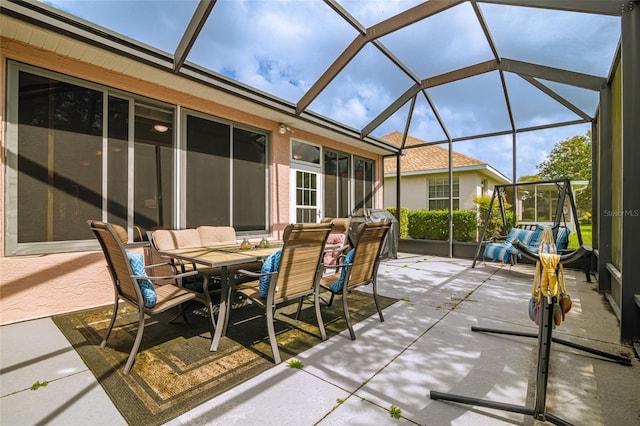 view of patio with a lanai