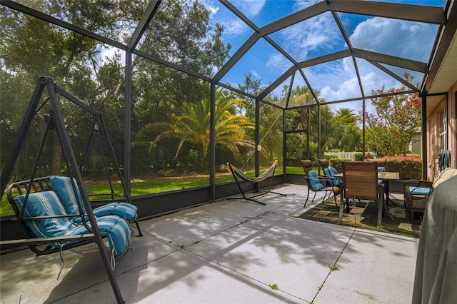 view of patio / terrace with glass enclosure