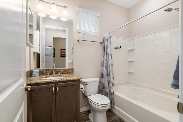 full bathroom with vanity, toilet, and shower / tub combo