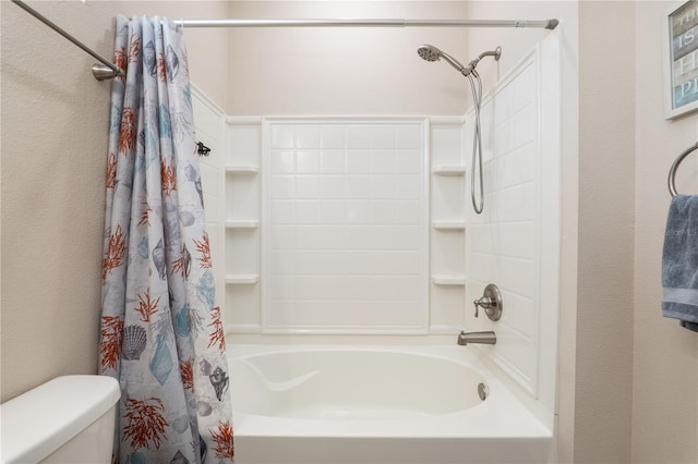 bathroom featuring toilet and shower / bath combo