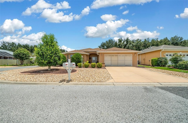 view of front of home with a garage