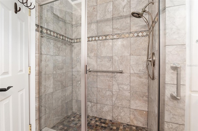 bathroom featuring an enclosed shower