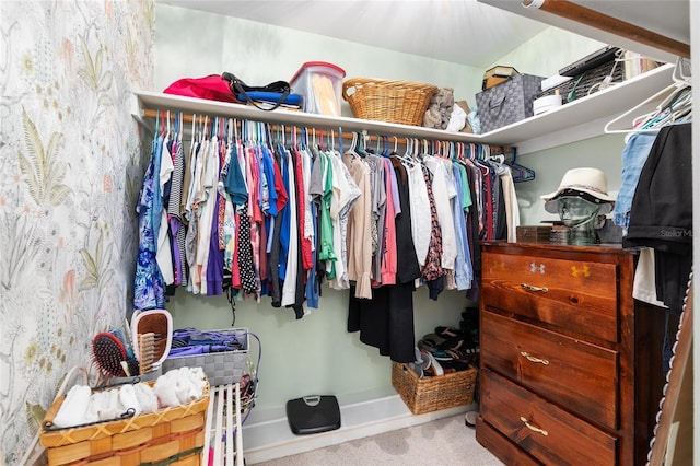 walk in closet featuring carpet