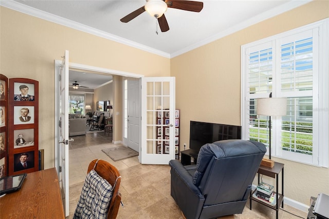 sitting room with a wealth of natural light, french doors, and ornamental molding