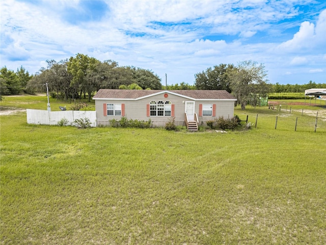 view of front of house featuring a front yard