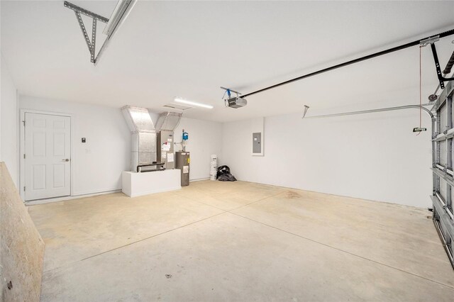 garage featuring electric panel, a garage door opener, and water heater