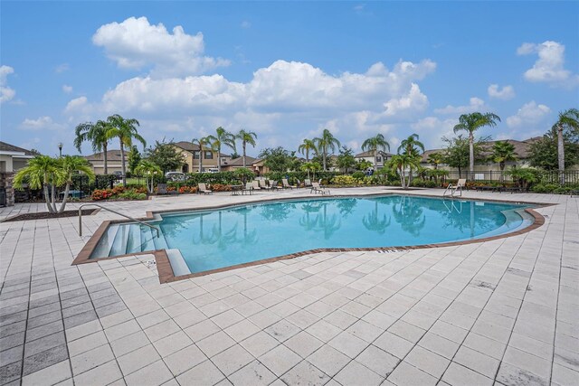 view of pool featuring a patio