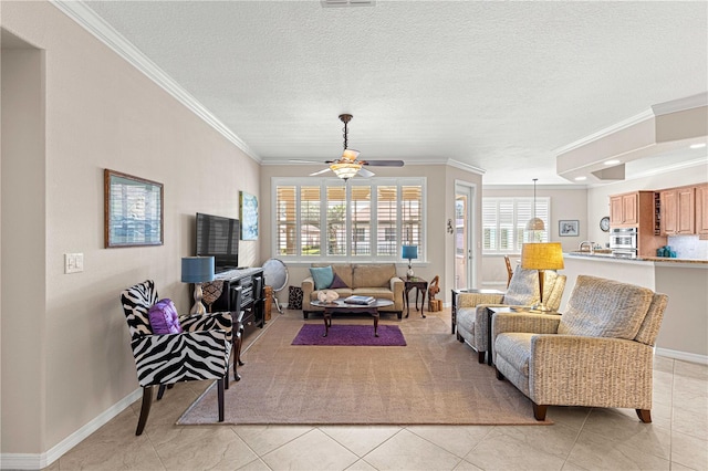 tiled living room with ornamental molding, ceiling fan, and a textured ceiling