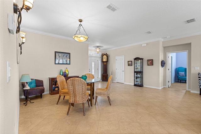 dining area with crown molding