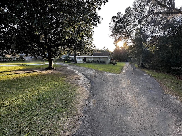 exterior space featuring a front lawn