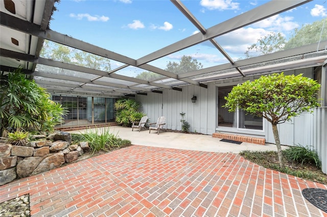 view of patio / terrace with glass enclosure