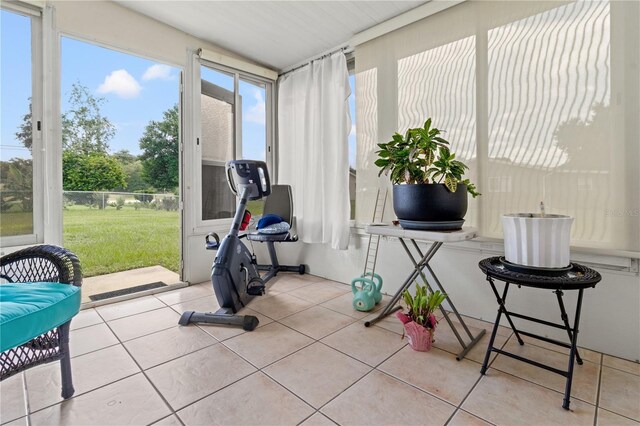 workout area with light tile patterned flooring