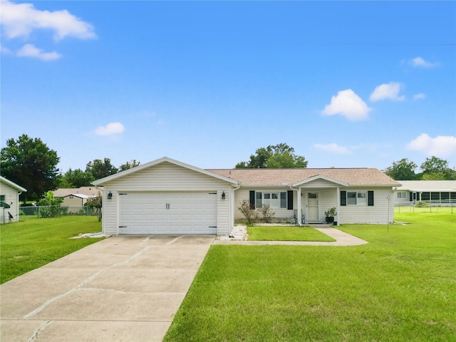 single story home with a front yard and a garage