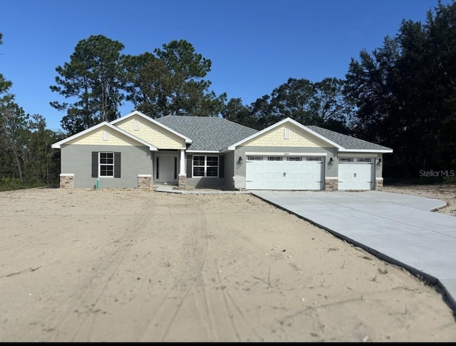 view of front of home with a garage