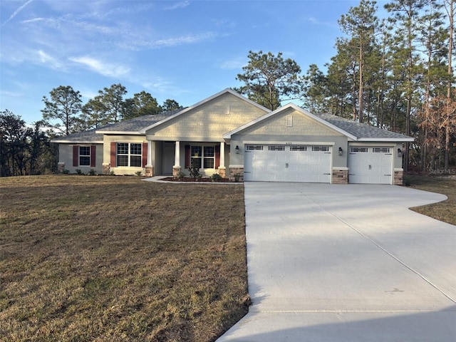 craftsman-style house with a garage and a front yard