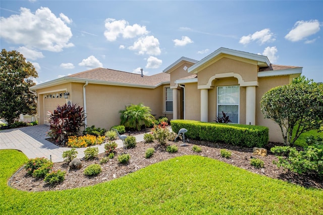 single story home featuring a garage