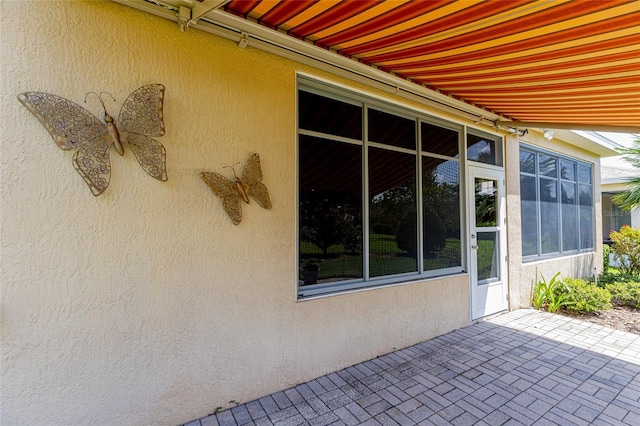 view of home's exterior with a patio