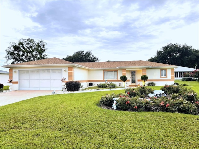 single story home featuring a garage and a front yard