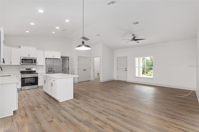 5 Emerald Trl, Ocala, FL 34472 - kitchen featuring a kitchen island, visible vents, appliances with stainless steel finishes, a sink, and open floor plan