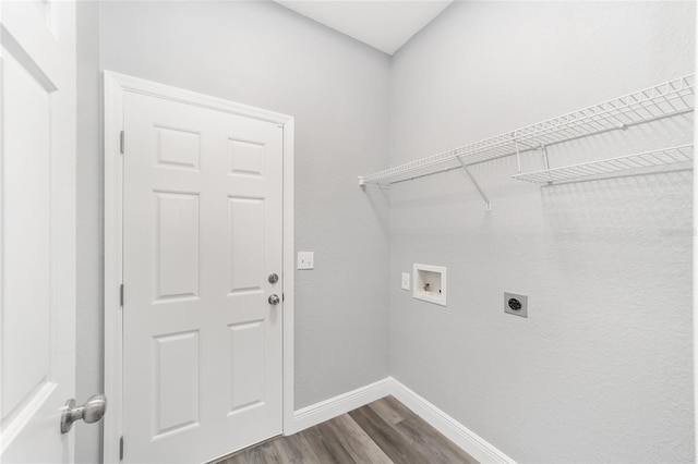 washroom with electric dryer hookup, hardwood / wood-style floors, and hookup for a washing machine