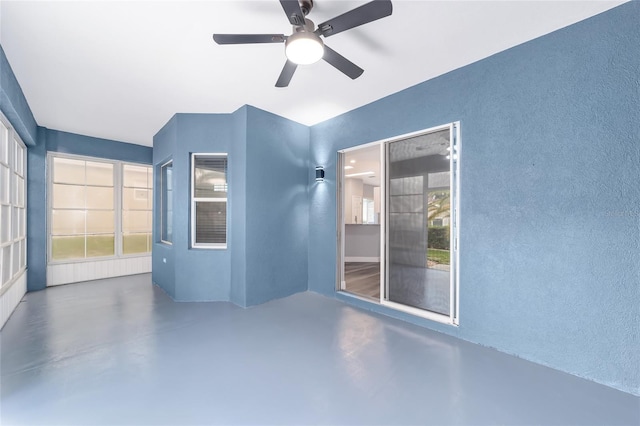 interior space featuring ceiling fan