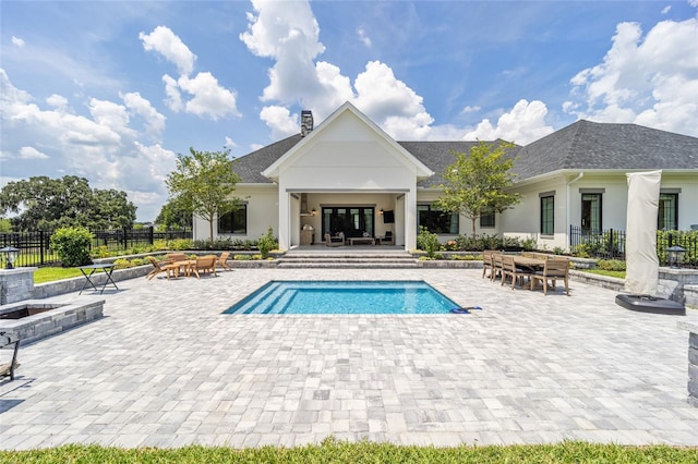 view of swimming pool with a patio