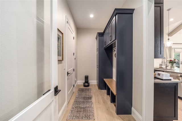 mudroom featuring light wood-type flooring