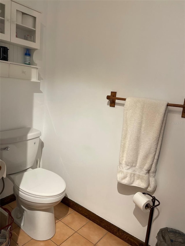 bathroom with tile patterned floors and toilet