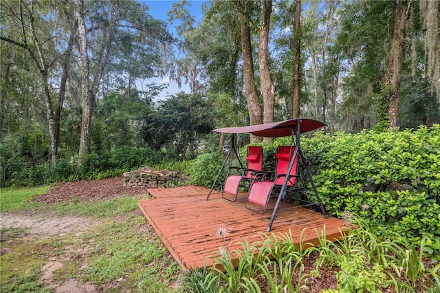 view of yard featuring a wooden deck