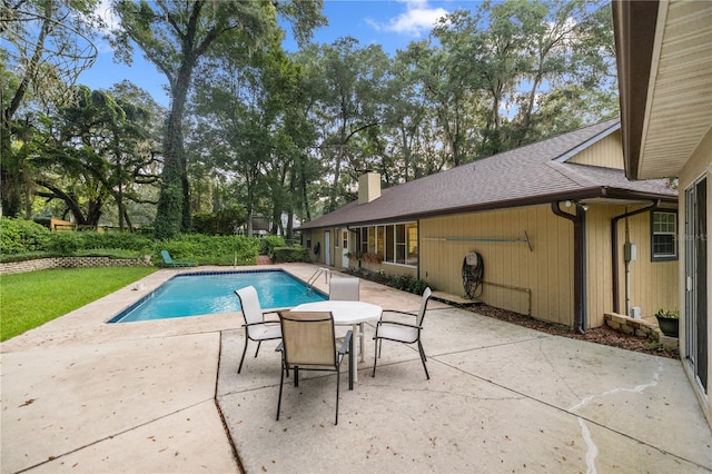 view of pool featuring a patio